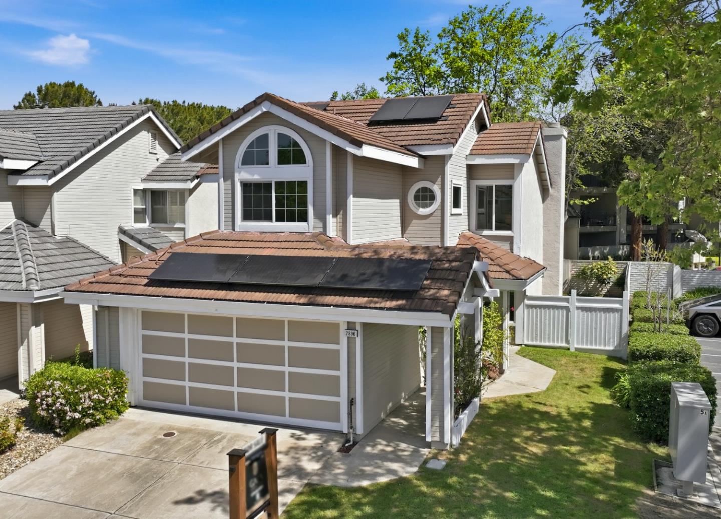 2896 Barrington Terrace Fremont, CA 94536 - Photo 60 of 64 a front view of a house with a garden