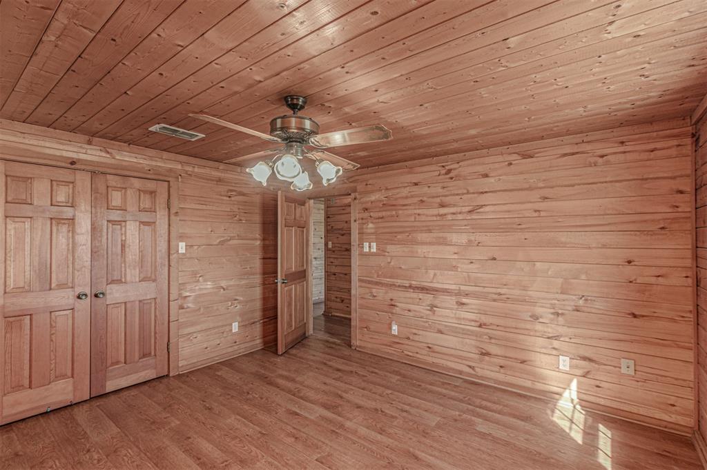 198 VZ County Road Ben Wheeler, TX 75754 - Photo 20 of 40 en empty room with wooden floor
