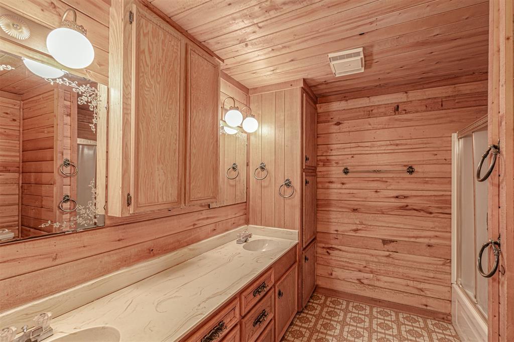 198 VZ County Road Ben Wheeler, TX 75754 - Photo 27 of 40 a bathroom with a sink and a mirror