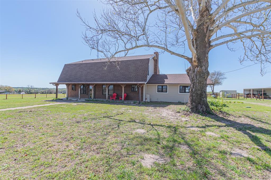 198 VZ County Road Ben Wheeler, TX 75754 - Photo 30 of 40 a view of a house with a yard and sitting area