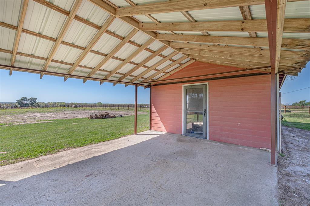 198 VZ County Road Ben Wheeler, TX 75754 - Photo 31 of 40 a view of an empty room with a garden and garage