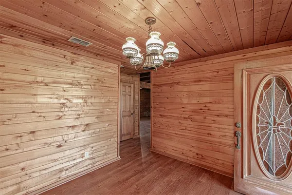 a view of a entryway with wooden floor