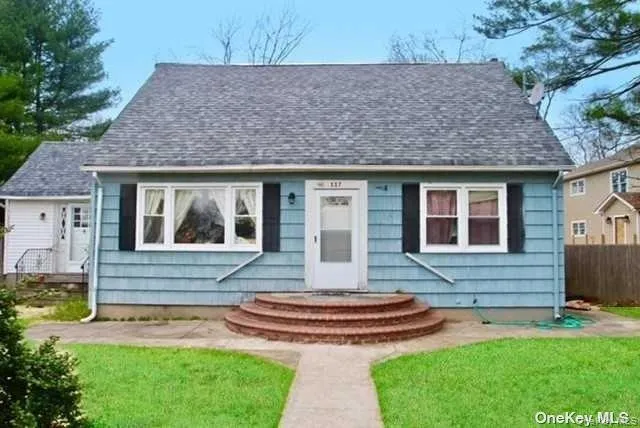 front view of house with a yard