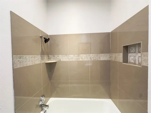 a bathroom with a bathtub