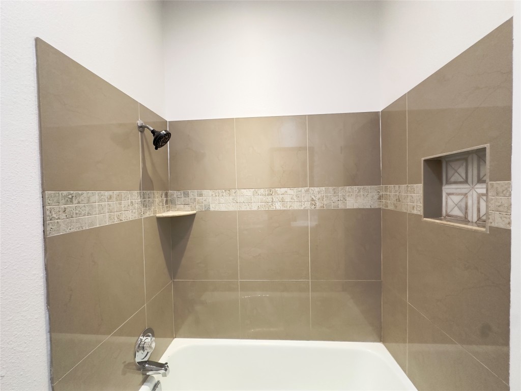 5504 Montview Street, Unit A OR B Austin, TX 78756 - Photo 16 of 27 a bathroom with a bathtub