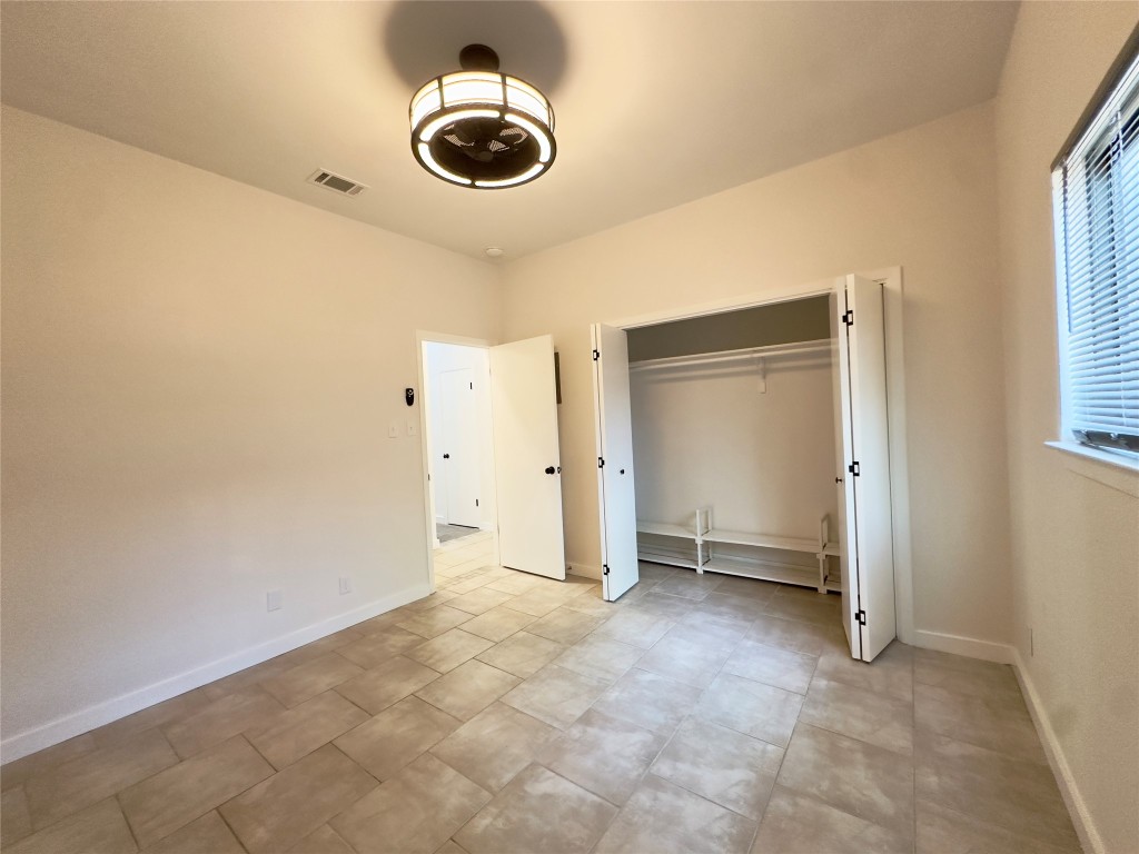 5504 Montview Street, Unit A OR B Austin, TX 78756 - Photo 17 of 27 a view of an empty room and window