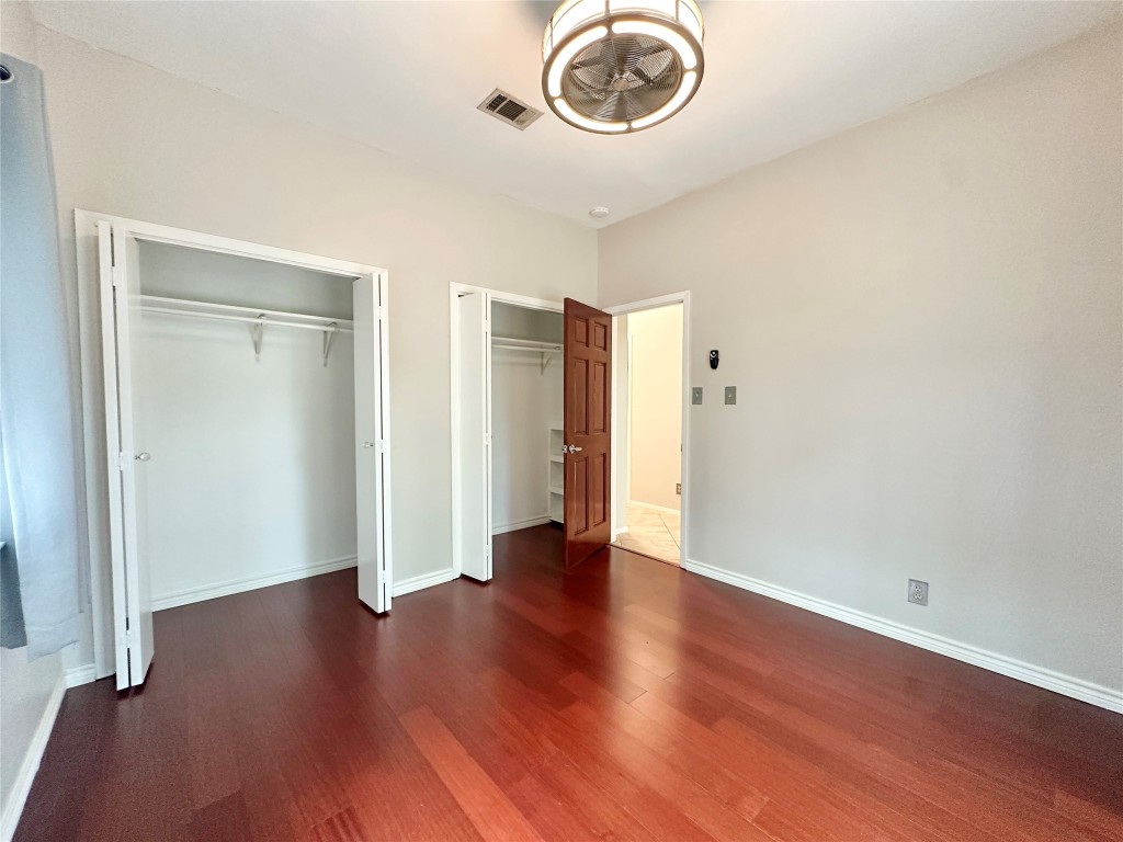 5504 Montview Street, Unit A OR B Austin, TX 78756 - Photo 18 of 27 an empty room with wooden floor and windows