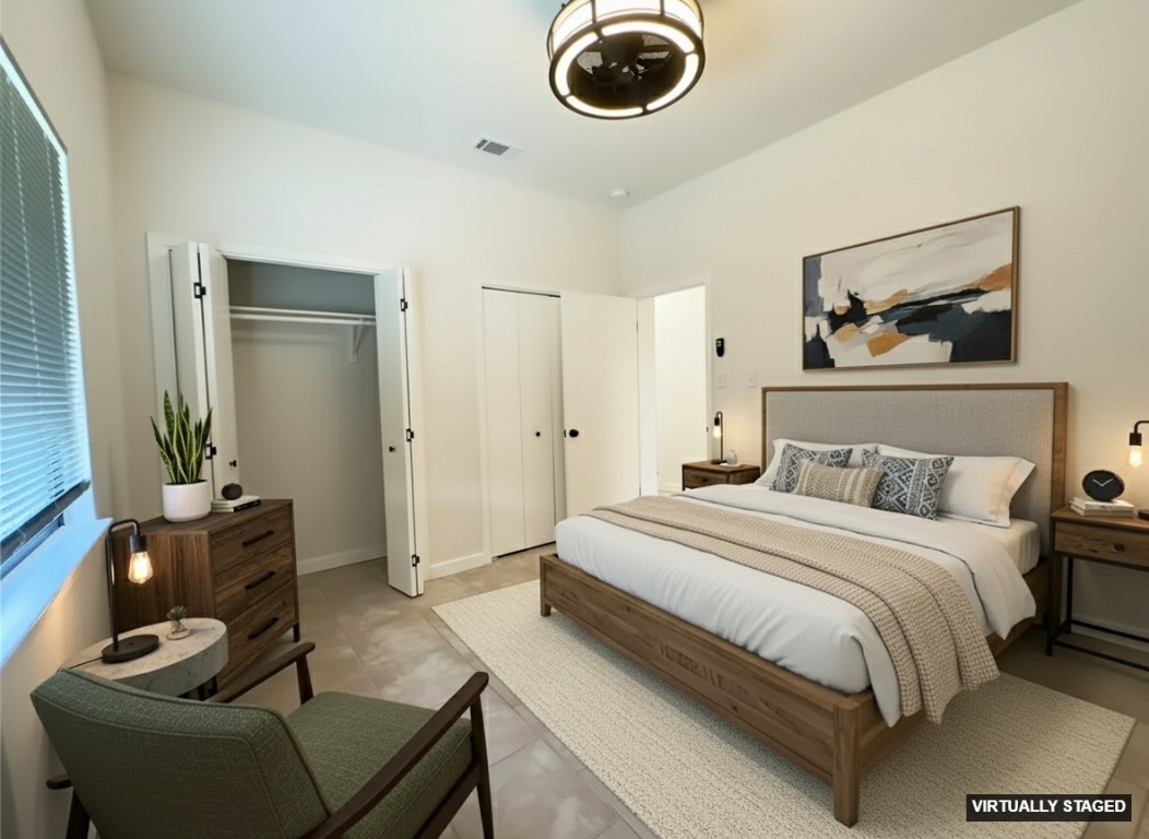 5504 Montview Street, Unit A OR B Austin, TX 78756 - Photo 2 of 27 a bedroom with bed and a chandelier