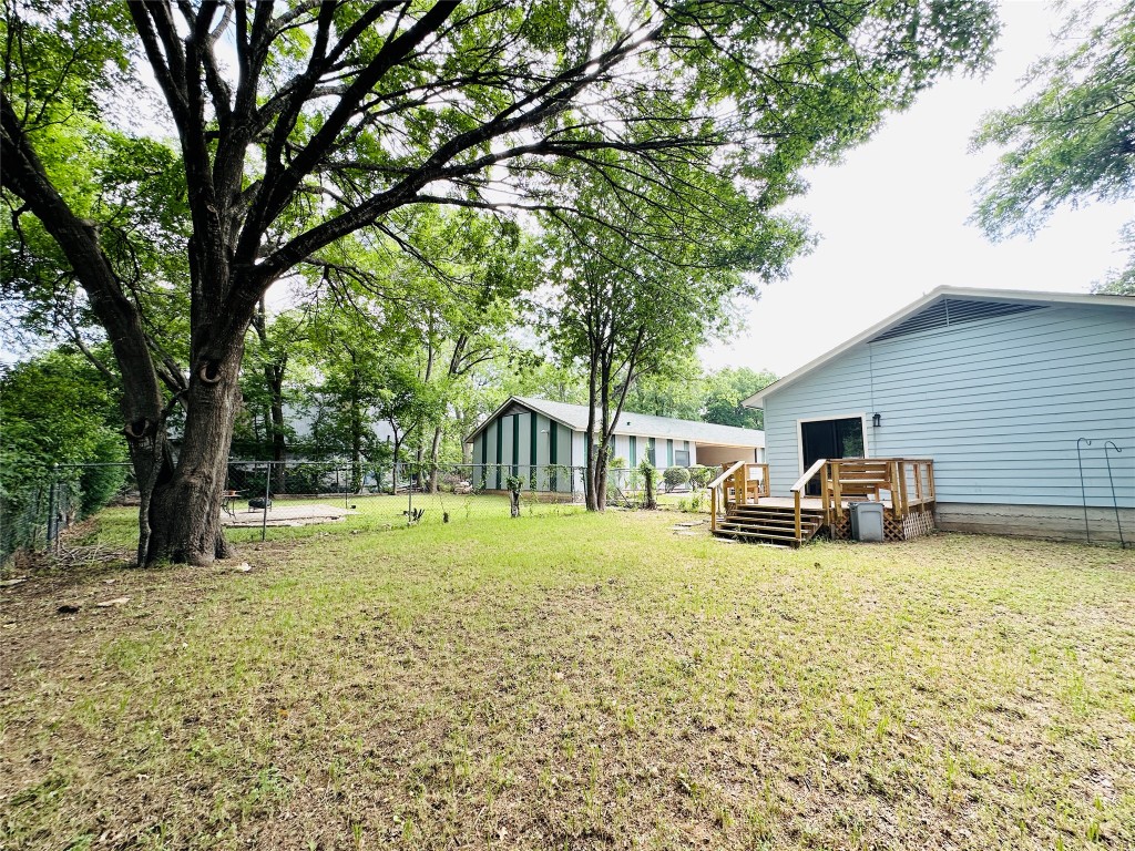 5504 Montview Street, Unit A OR B Austin, TX 78756 - Photo 27 of 27 a view of a yard with a house and a tree