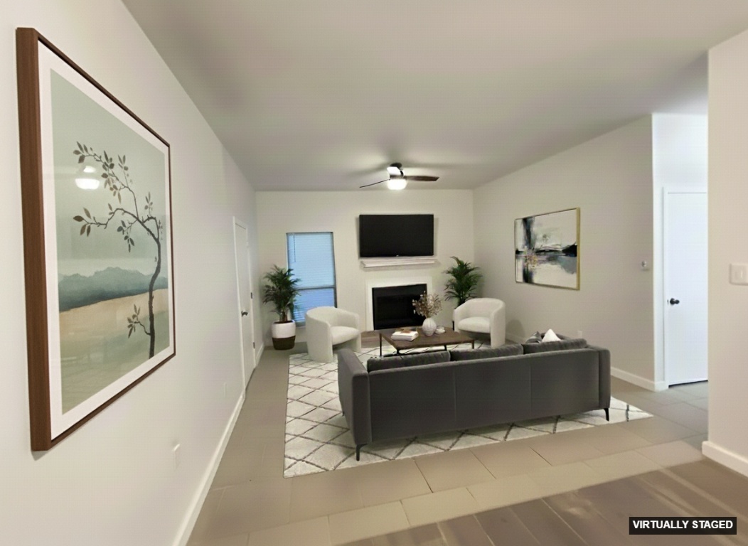 5504 Montview Street, Unit A OR B Austin, TX 78756 - Photo 5 of 27 a living room with furniture a fireplace and a flat screen tv