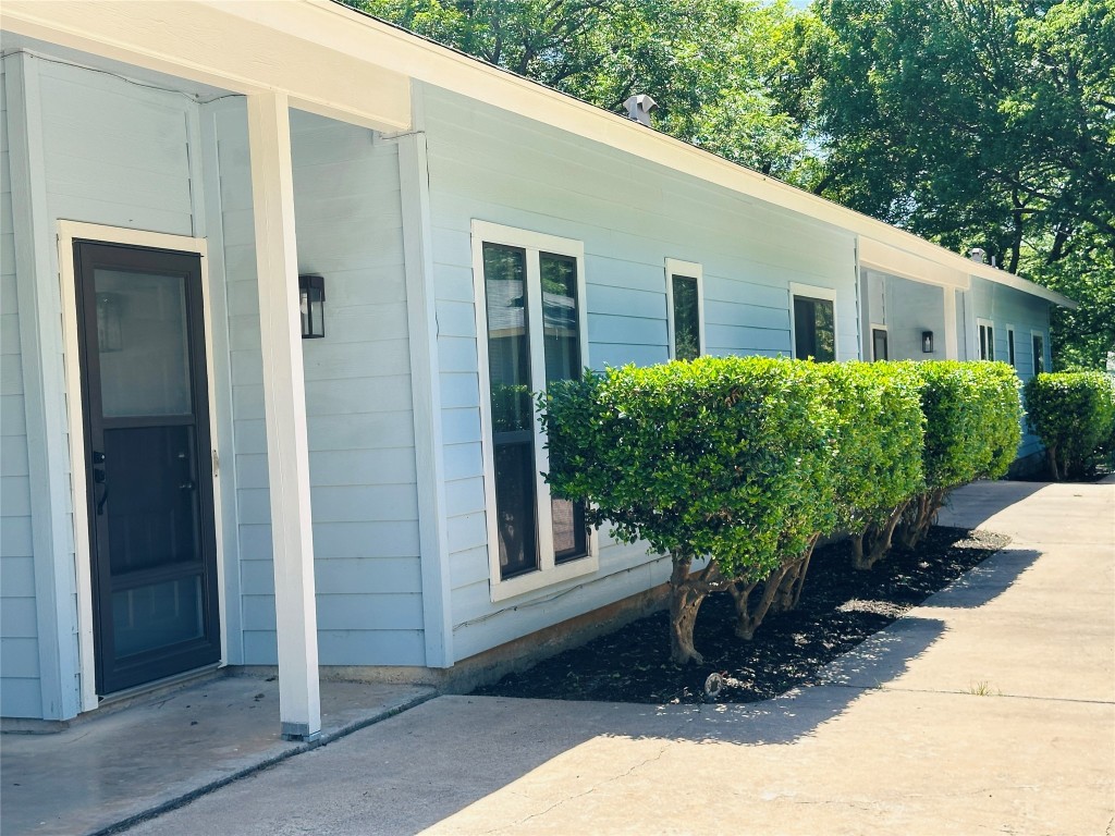 5504 Montview Street, Unit A OR B Austin, TX 78756 - Photo 8 of 27 a front view of a house with garden
