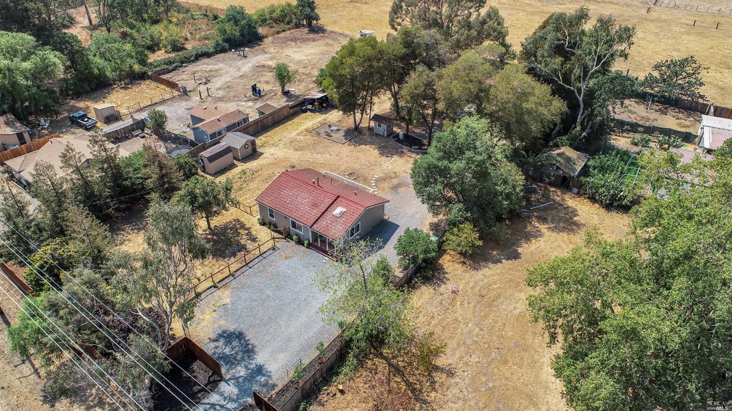4645 Stony Point Road Santa Rosa, CA 95407 - Photo 1 of 1 1 acre rectangular and this view shows the front house and back house is under the trees