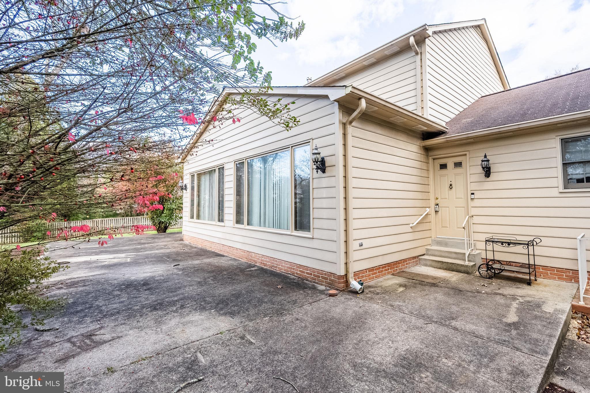 8454 Toll House Road Annandale, VA 22003 - Photo 13 of 65 a view of a house with a yard