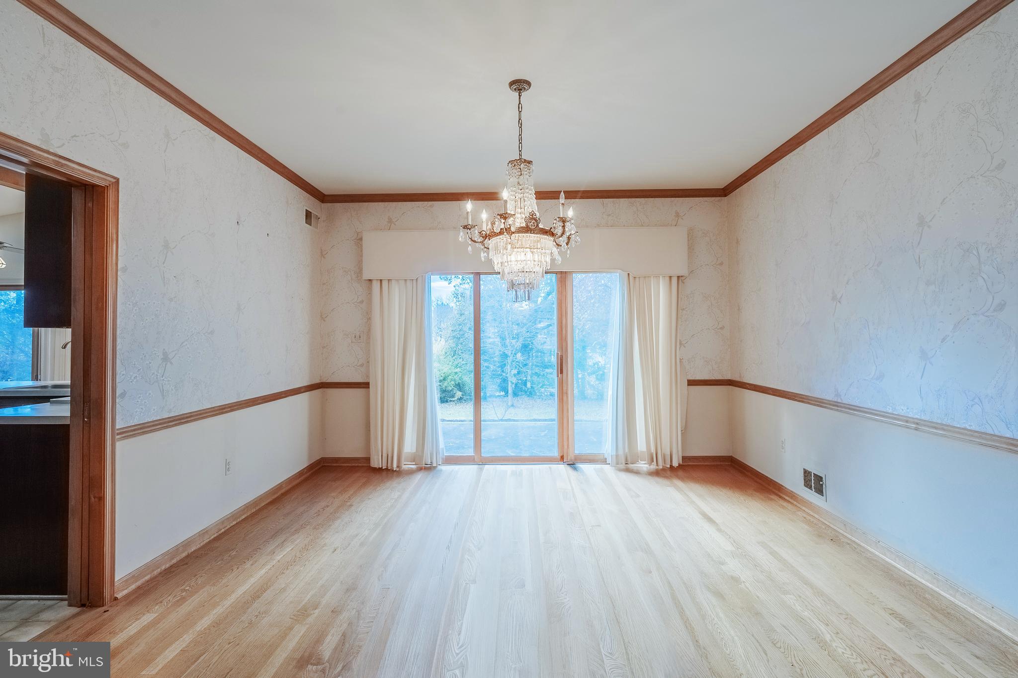 8454 Toll House Road Annandale, VA 22003 - Photo 26 of 65 a view of empty room with wooden floor and fan