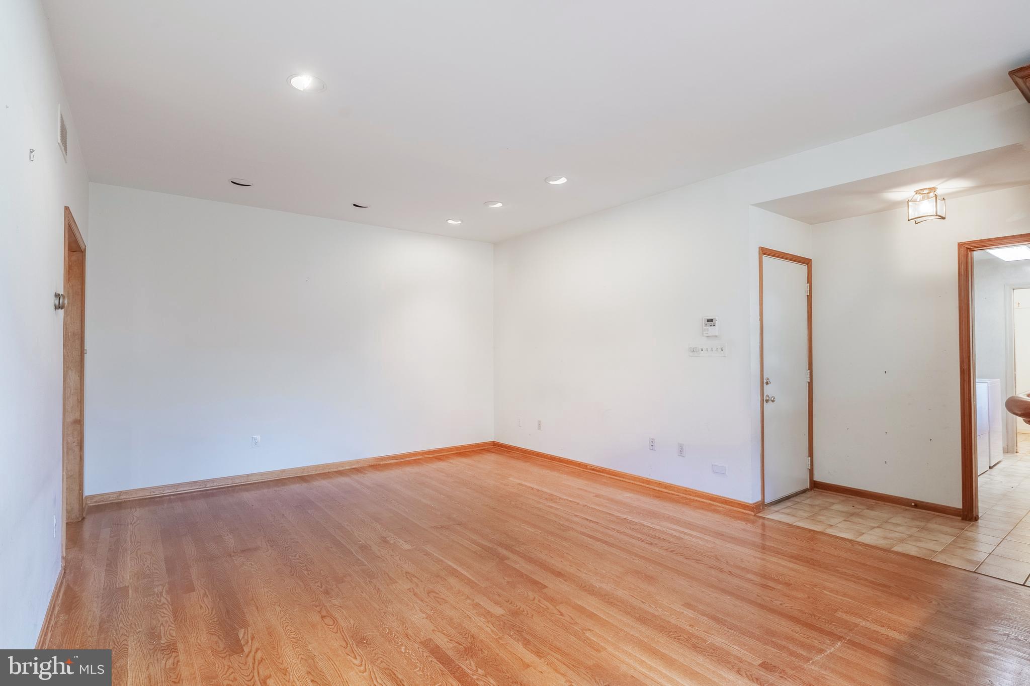 8454 Toll House Road Annandale, VA 22003 - Photo 34 of 65 a view of empty room with wooden floor