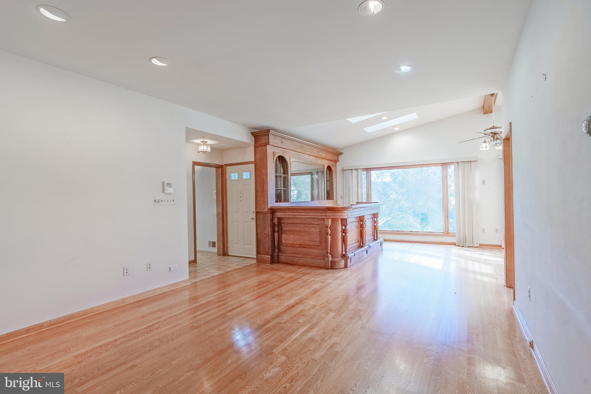 8454 Toll House Road Annandale, VA 22003 - Photo 35 of 65 a living room with furniture and a wooden floor