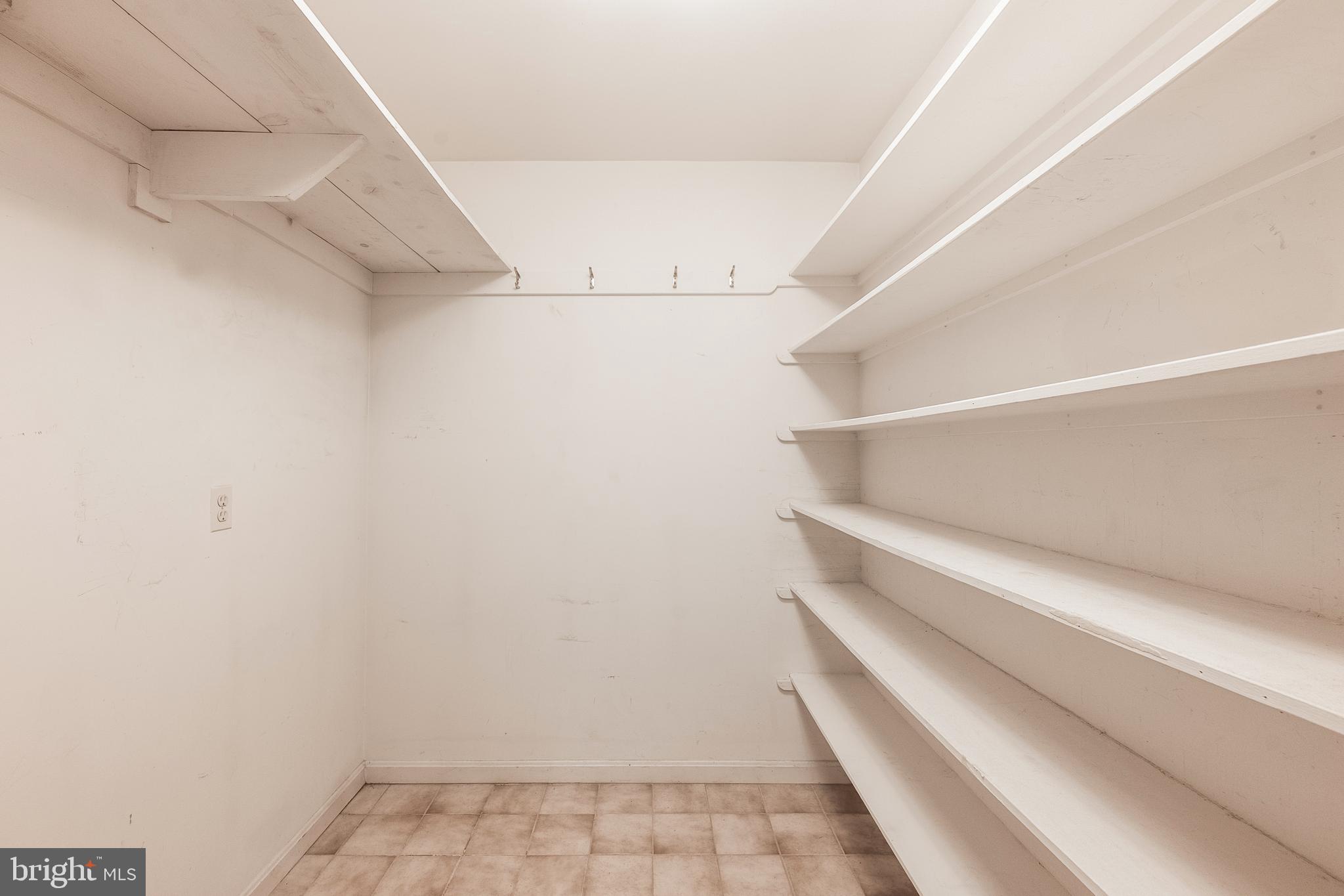 8454 Toll House Road Annandale, VA 22003 - Photo 38 of 65 a view of an empty walk in closet