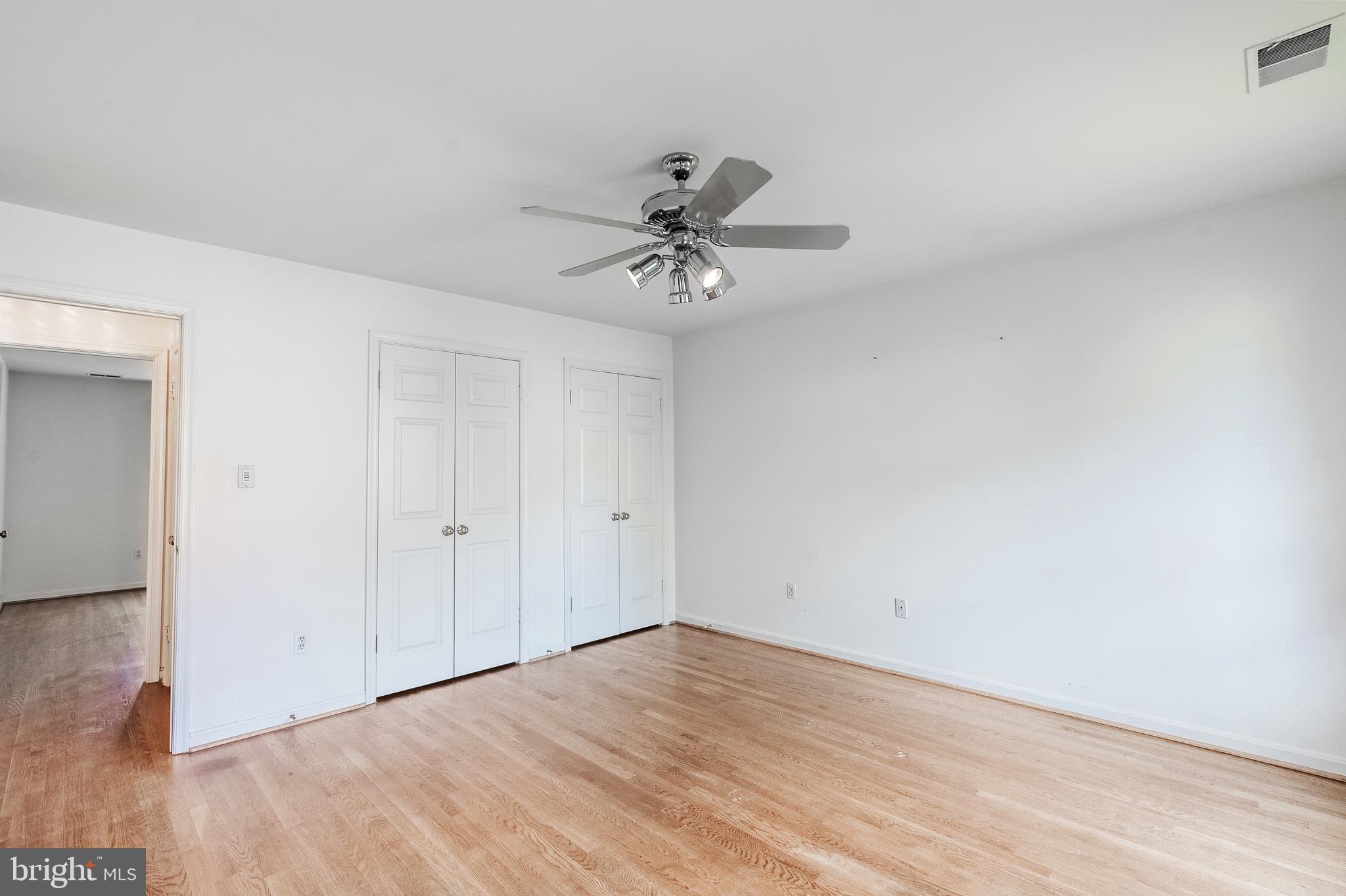 8454 Toll House Road Annandale, VA 22003 - Photo 52 of 65 a view of a room with a fan and a ceiling fan