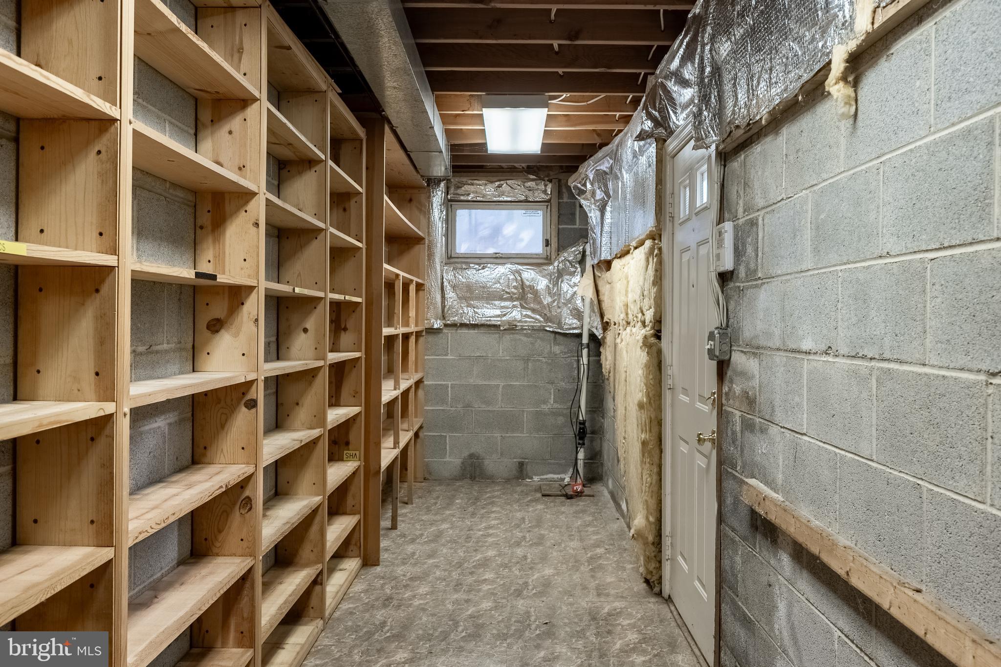 8454 Toll House Road Annandale, VA 22003 - Photo 58 of 65 a view of walk in closet with empty racks