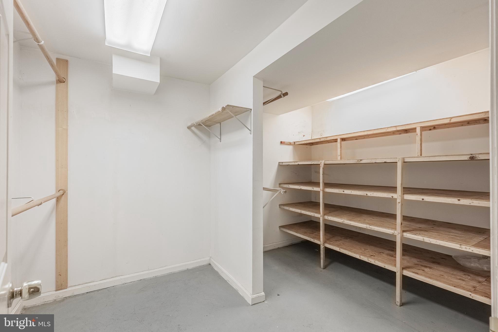 8454 Toll House Road Annandale, VA 22003 - Photo 62 of 65 a view of an empty walk in closet