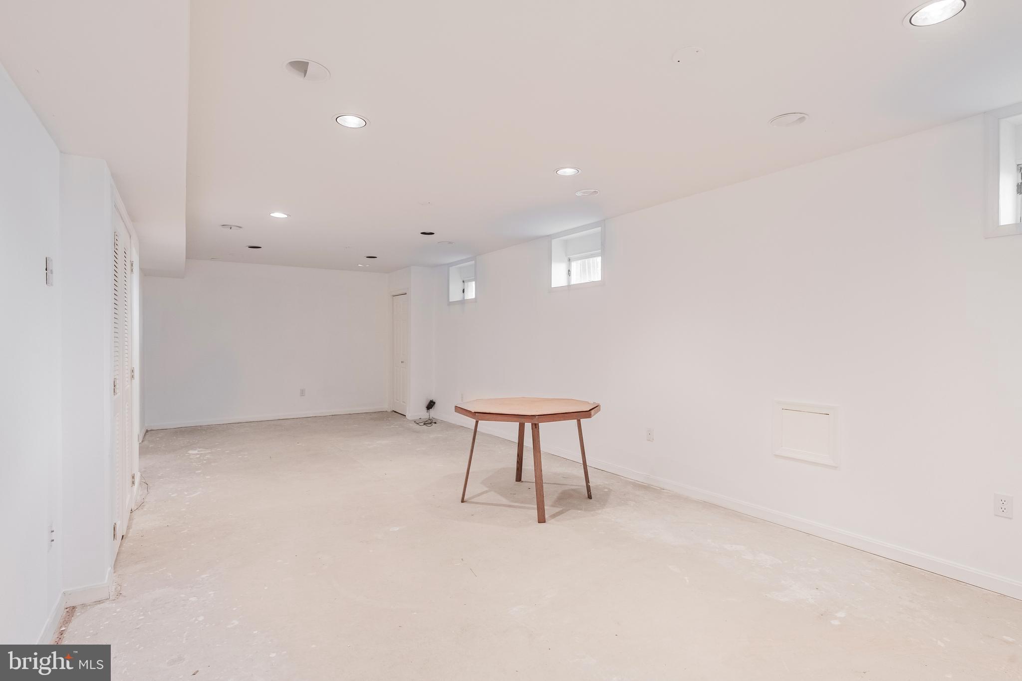 8454 Toll House Road Annandale, VA 22003 - Photo 65 of 65 a view of wooden floor and a bench in a room