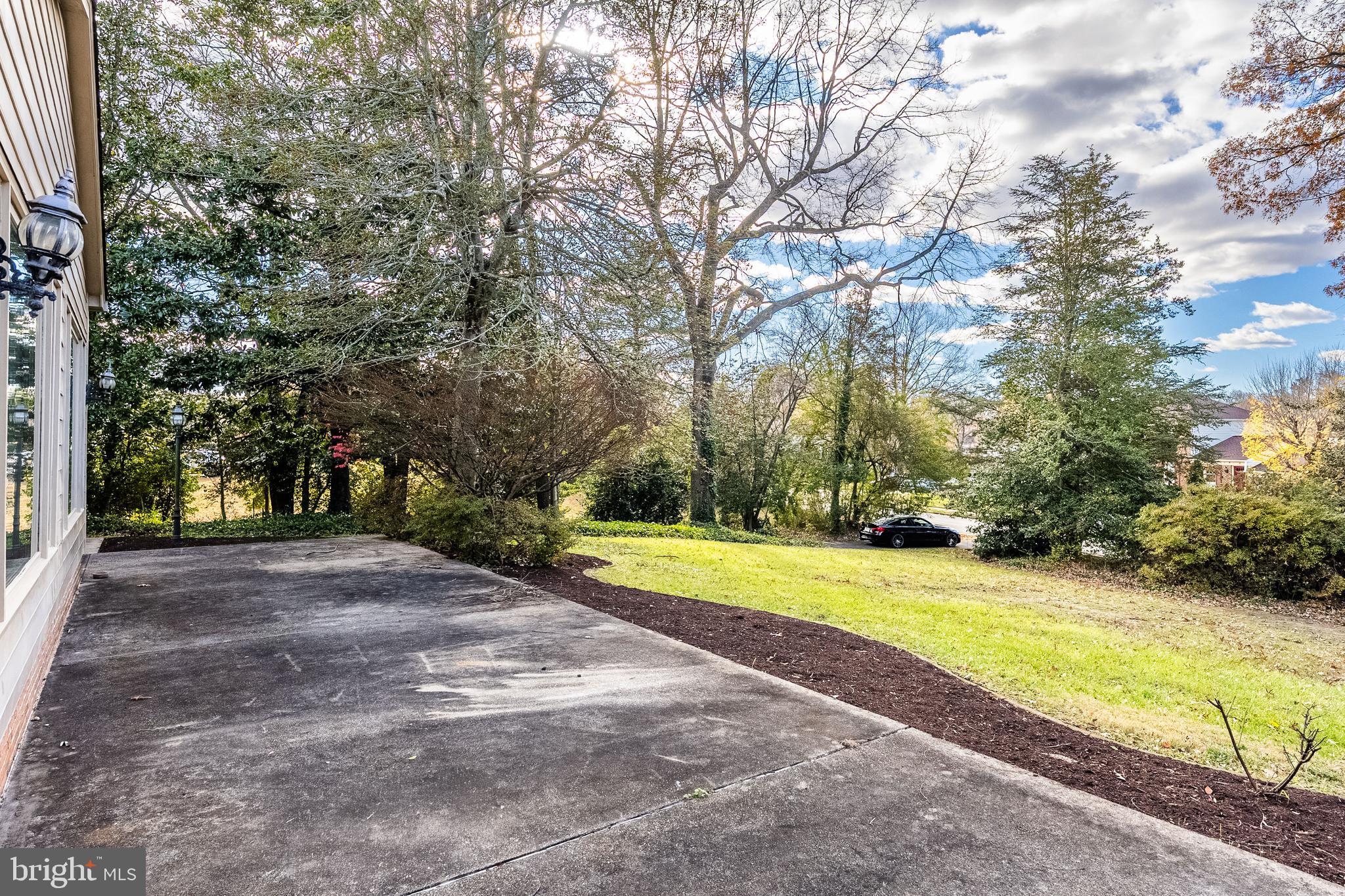 8454 Toll House Road Annandale, VA 22003 - Photo 9 of 65 a view of a yard with large trees
