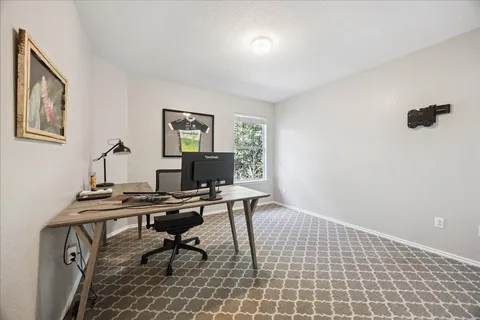 a view of a workspace with a window