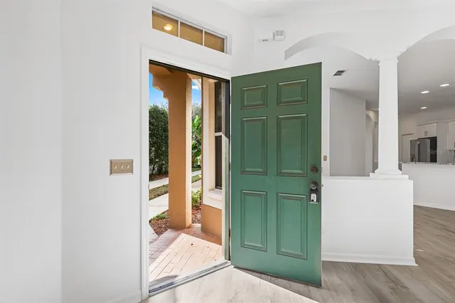 a bathroom with a shower and a mirror