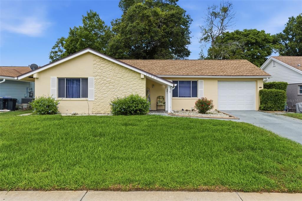 12219 Quail Run Row Bayonet Point, FL 34667 - Photo 1 of 36