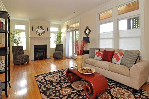 92 Herrick Road, Unit 92 Newton, MA 02459 - Photo 8 of 28 a living room with furniture a fireplace and a large window
