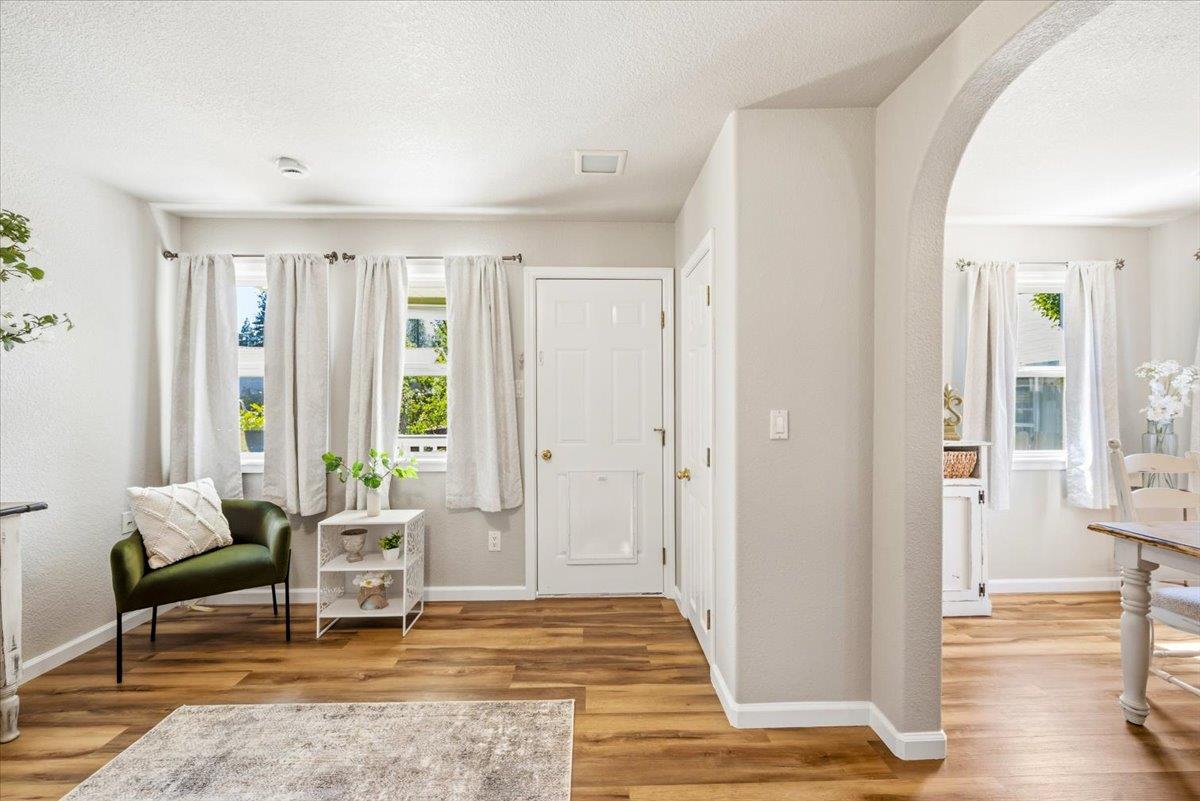 232 Upper Slate Creek Road Grass Valley, CA 95945 - Photo 3 of 48 a living room with furniture and a table