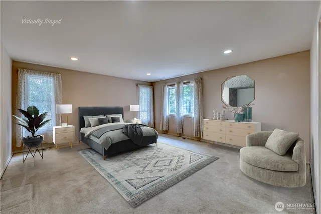 an empty room with windows and closet