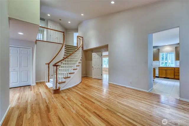 a view of entryway with wooden floor