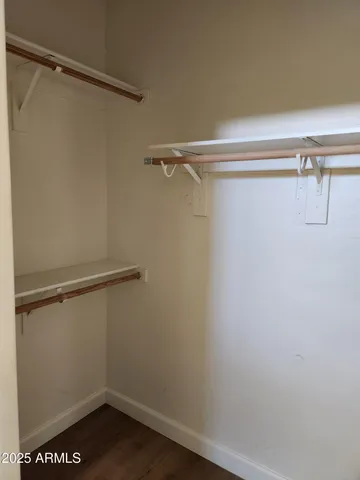 a view of a room with racks on the wall