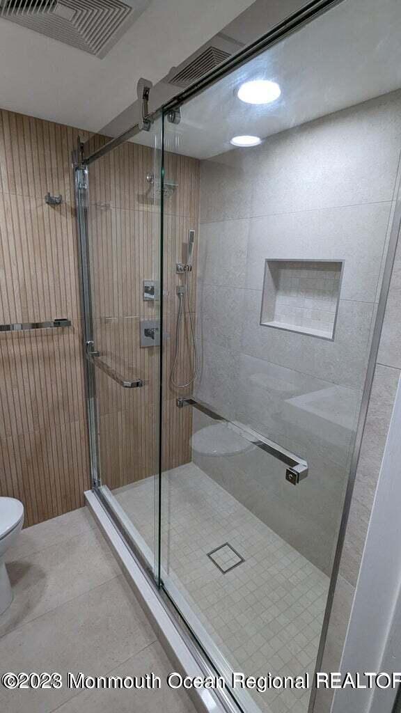 254 Garfield Avenue Oakhurst, NJ 07755 - Photo 14 of 26 a bathroom with a shower