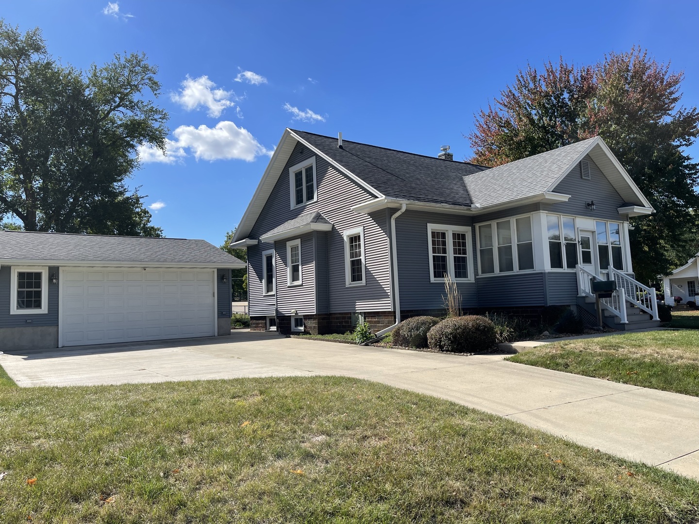 229 West Moore Street Ottawa, IL 61350 - Photo 2 of 33 a front view of a house with a yard and garage