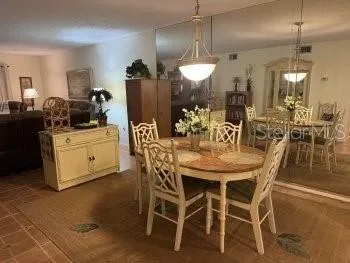 a view of a dining room with furniture