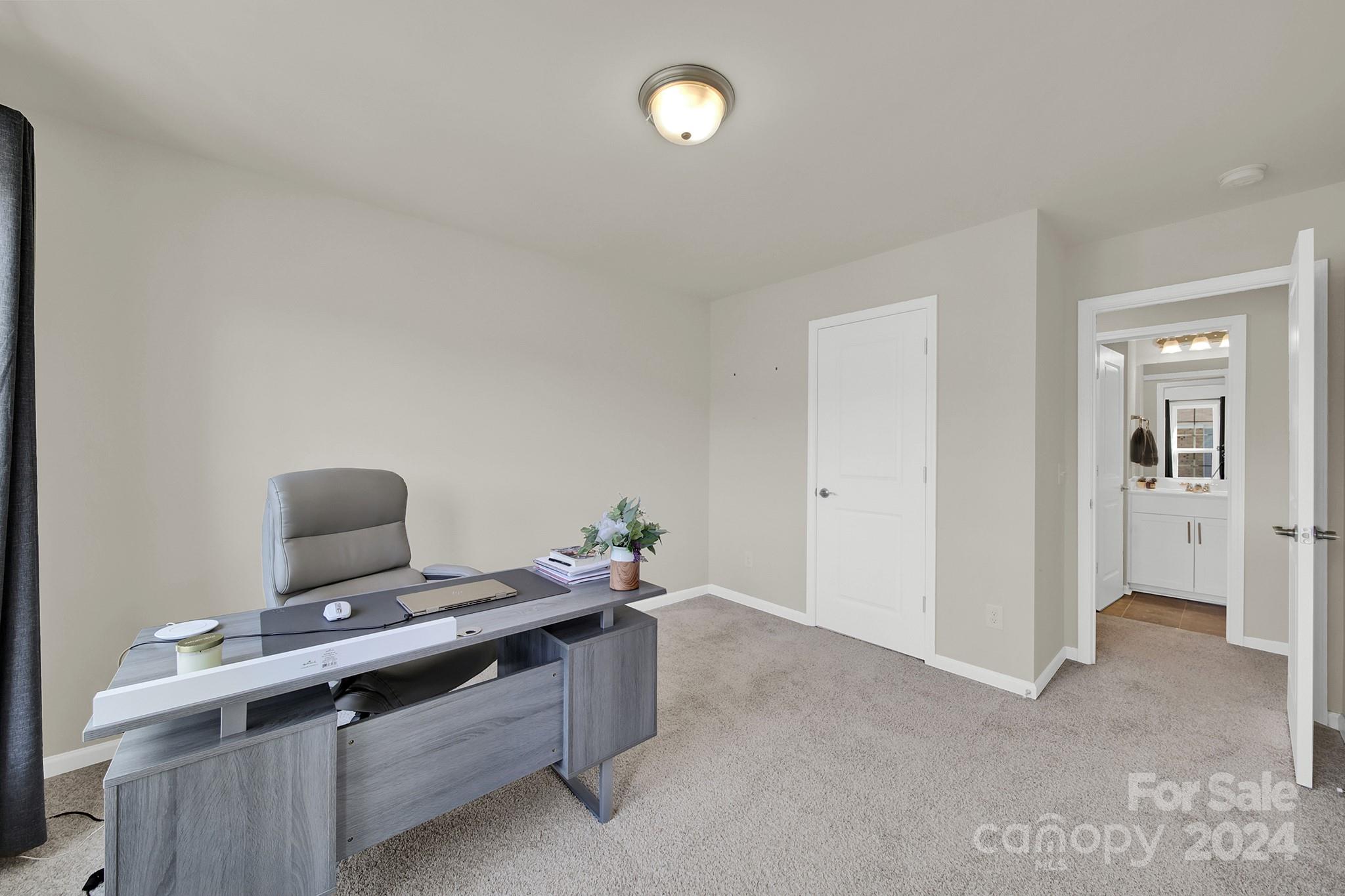 818 Canoe Song Road Fort Mill, SC 29708 - Photo 18 of 36 a view of workspace with lounge chair