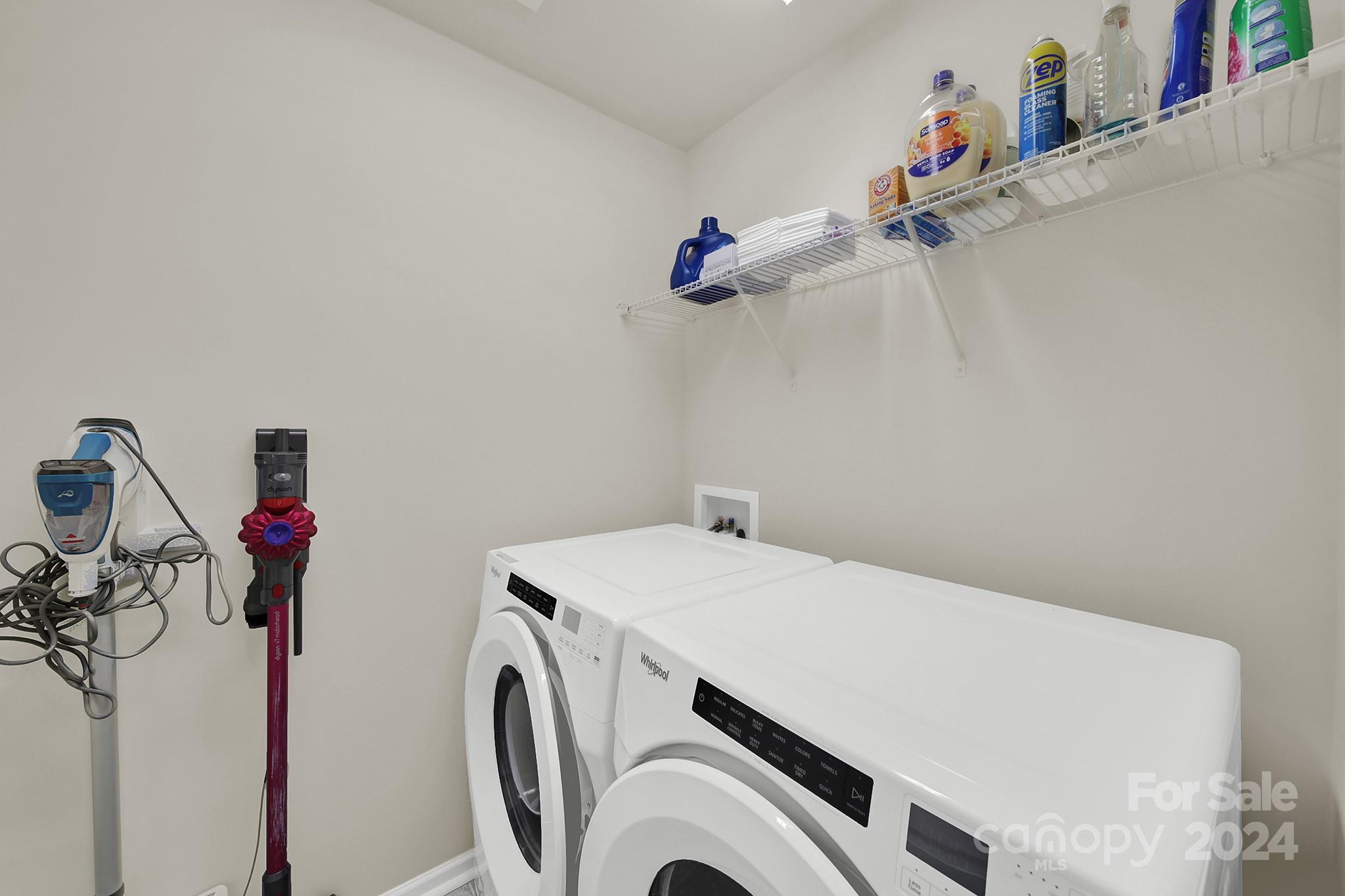 818 Canoe Song Road Fort Mill, SC 29708 - Photo 24 of 36 a utility room with dryer and washer