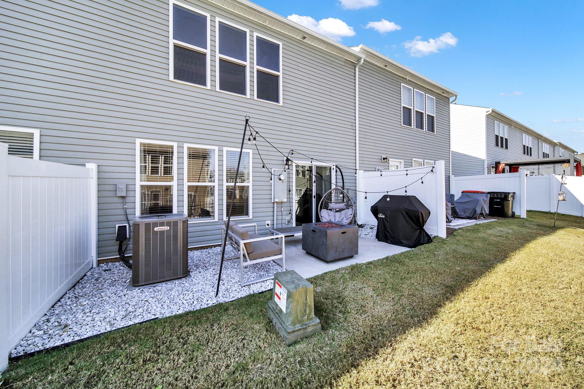 818 Canoe Song Road Fort Mill, SC 29708 - Photo 29 of 36 a house view with a backyard space