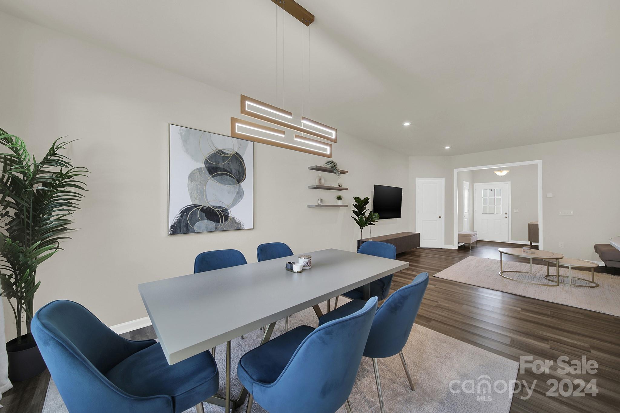 818 Canoe Song Road Fort Mill, SC 29708 - Photo 7 of 36 a view of a dining room with furniture