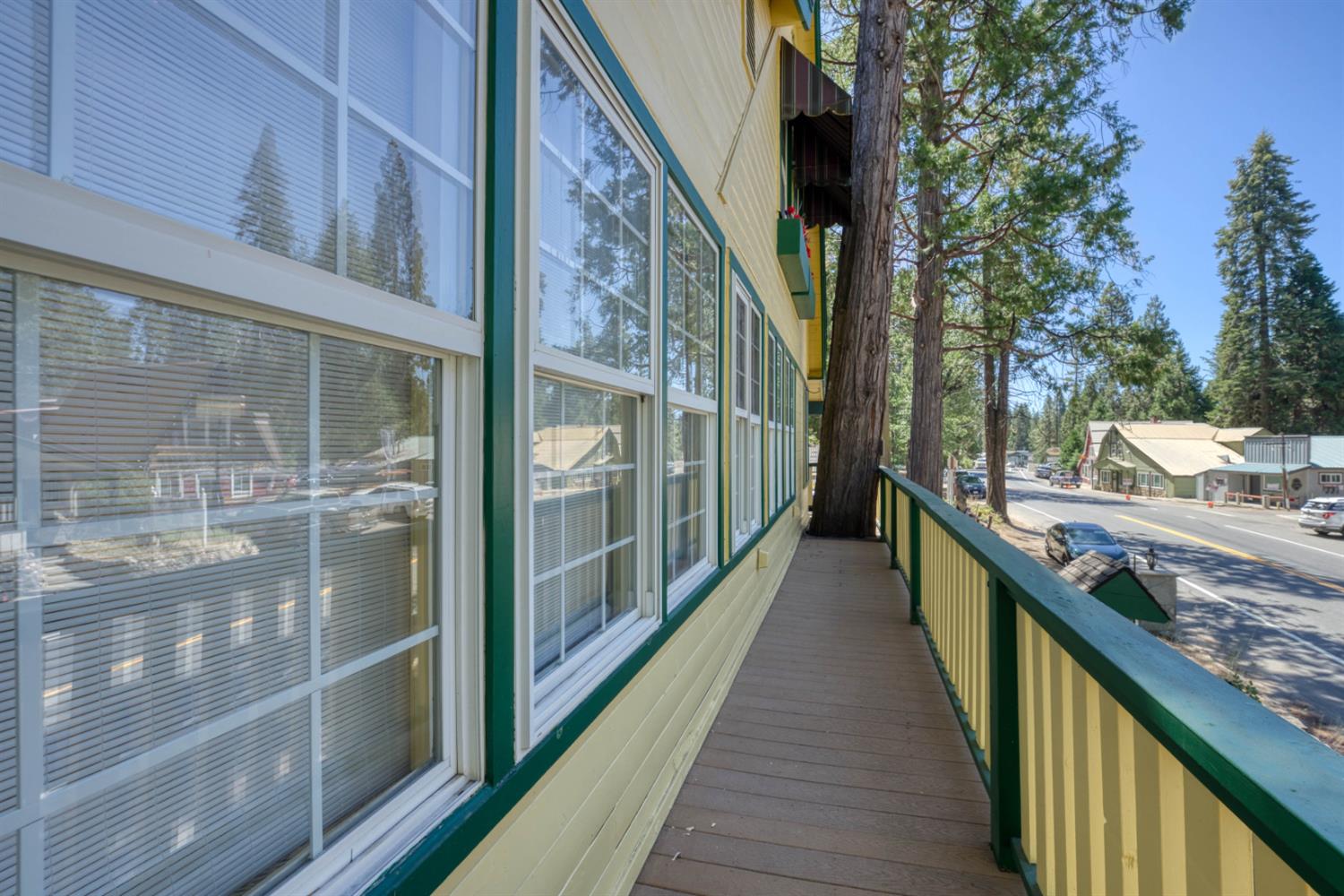 42025 Tollhouse Road Shaver Lake, CA 93664 - Photo 16 of 64 a view of a balcony with a potted plant