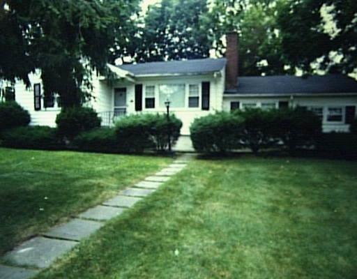 a view of a house with a garden
