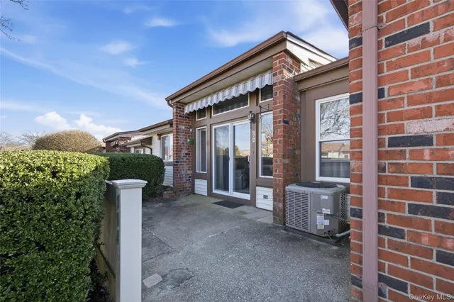 a front view of a house with a porch