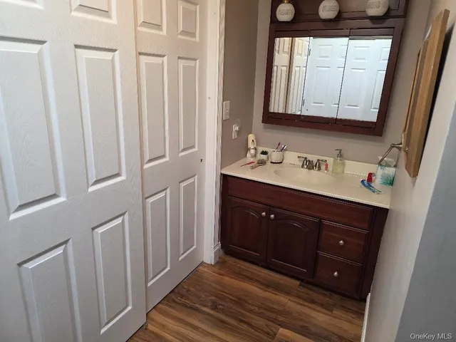 a bathroom with a sink and toilet