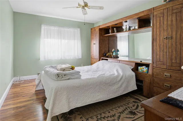 a view of a porch with a table and chairs