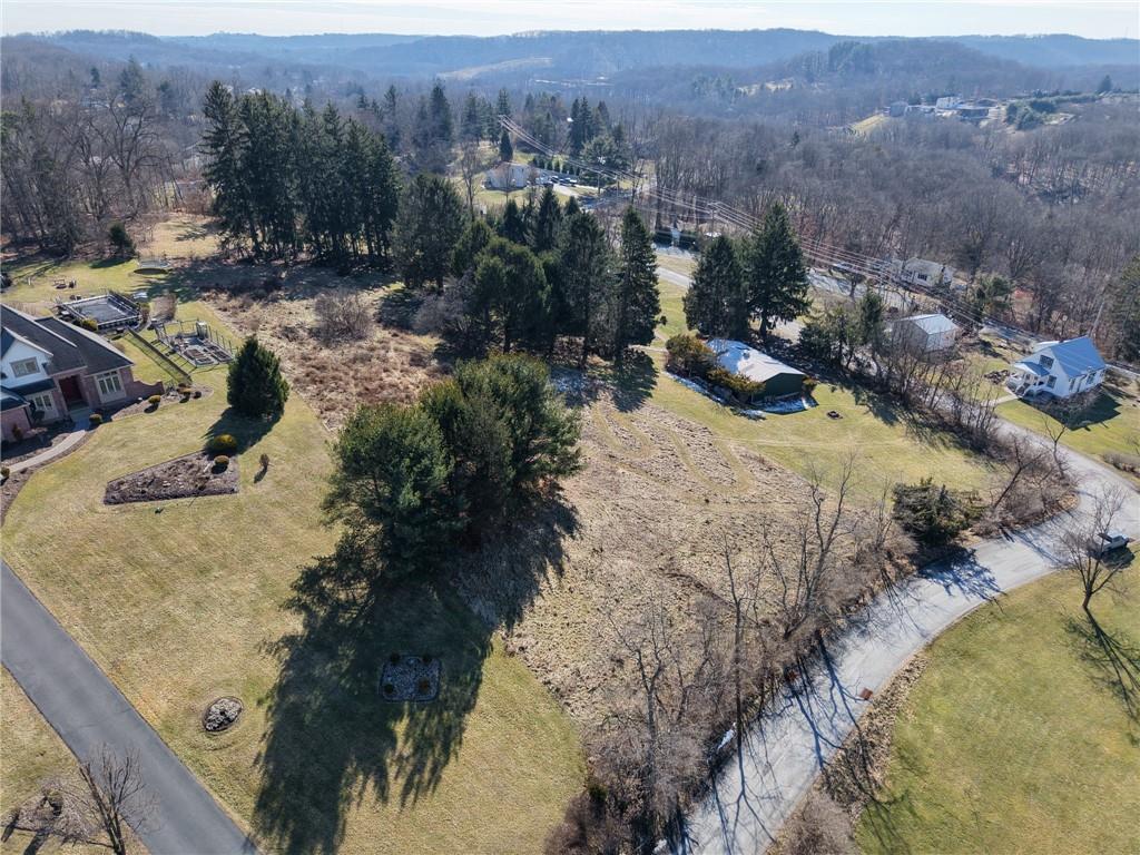 4990 Lakewood Road Gibsonia, PA 15044 - Photo 8 of 10 a view of a houses with a yard