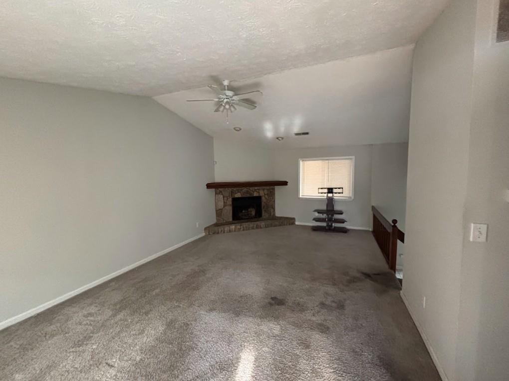 2174 Scarbrough Road Stone Mountain, GA 30088 - Photo 2 of 8 a view of a livingroom with furniture and a fireplace