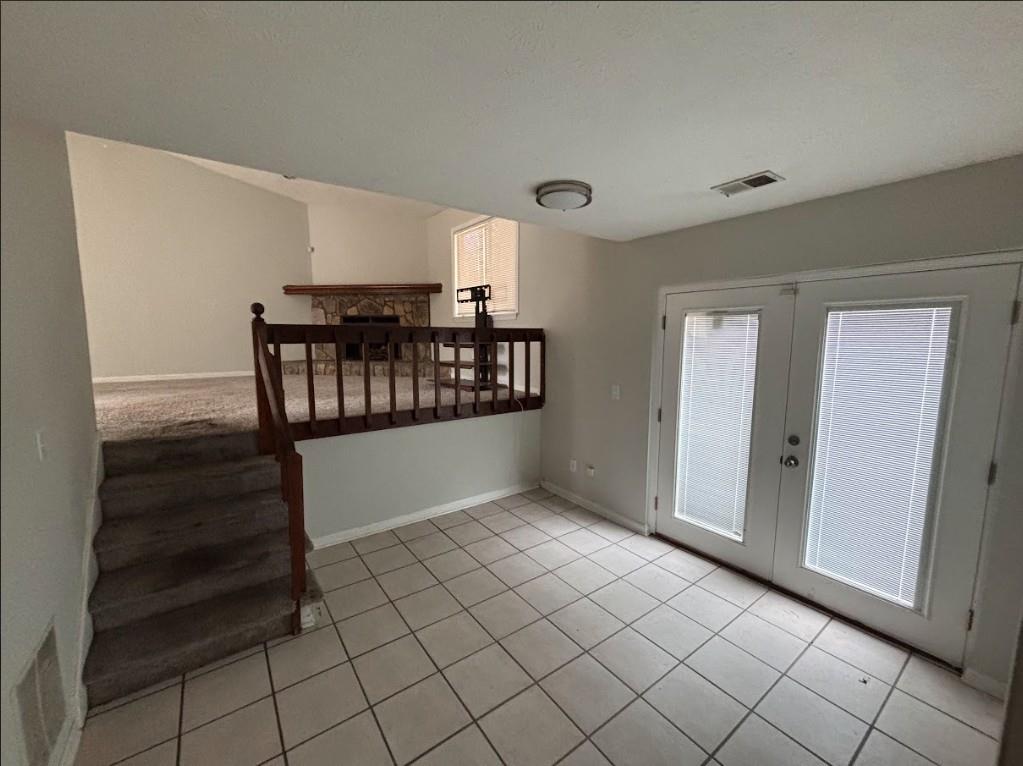 2174 Scarbrough Road Stone Mountain, GA 30088 - Photo 4 of 8 a view of entryway with stairs and a window