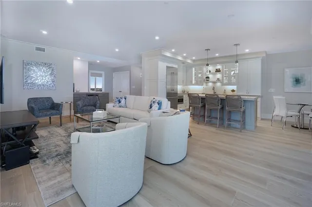 a dining table with chairs and wooden floor